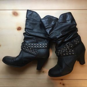 Lightly worn black studded boots